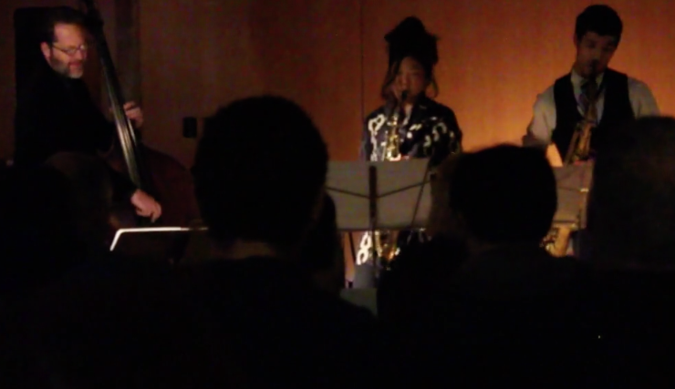 Grace Kelly Jazz Saxophonist plays with robots